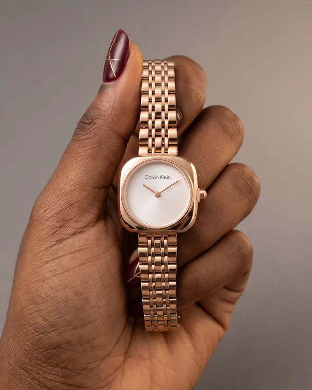 A rose-gold Calvin Klein worn on a wrist